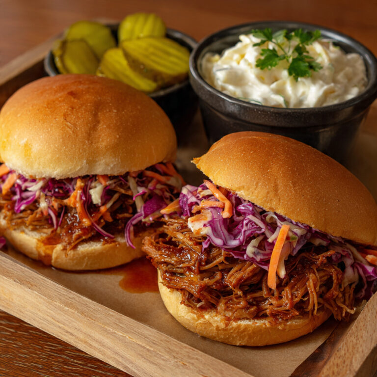 BBQ Pulled Pork with Coleslaw & Pickles on Wooden Board